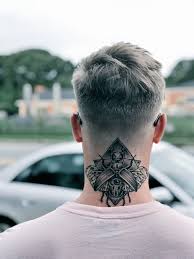 Both men and women decorate their necks with fancy jewelry and trinkets, including necklaces, so their necks look elegant and gorgeous. Traditional Back Of Neck Tattoos Men