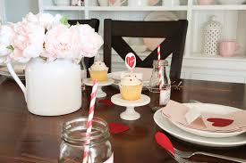 A natural linen napkin rests centered on a plain white dinner plate. Valentines Day Table Decorations The Idea Room