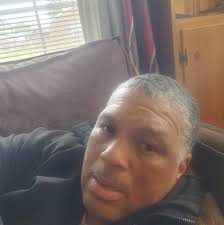 Pernell "Sweet Pea" Whitaker shows off his belts