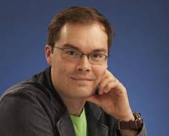 What do you most want to understand about how collective features emerge in  microbial communities?