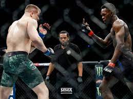 Israel adesanya and marvin vettori face off before ufc 263. E1vfppjvjfbdfm