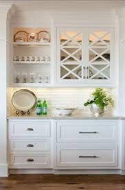 These days, we mostly take cabinets to the ceiling or at least higher than this, so my purpose here was to blend the cabinetry with the wall color so that these older cabinets didn't stand out or get noticed. How To Make Your Kitchen Beautiful With Glass Cabinet Doors Heather Hungeling Design