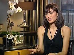 By the age of 18 she had already appeared on the covers of. Olga Kurylenko Quantum Of Solace Back