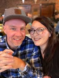 He's thinking is it her natural hair or does she coloured it
