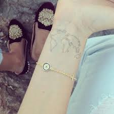 Chiara ferragni tattoos discover them all. Chiaraferragni New Bracelet From Greece Theblondesaladgoestogreece Globe Tattoos Tattoos Map Tattoos