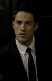 I think he's one of the Grey Folk (I also think Angela is one of them too,  which is why she was his apprentice). I think he's either after the Name of