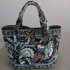 The vera bradley design ethic stems from stylish quilted cotton luggage, handbags, vera bradley eyewear, and accessories by combining smart product designs along with colorful fabrics and trims. Vera Bradley Bags Vera Bradley Blue Brown Paisley Floral Bag Poshmark