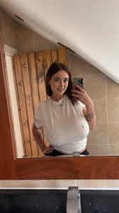 Adorable blue eyed teen with huge juggs Brooke Mills poses in a tight shirt  - pornpic.com