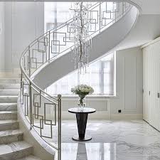 The staircase is an extremely important design element. Big Window Behind Stairs So Appear Not Fully Connected Different Railing And Not Wood Steps Home Stairs Design Stairs Design Modern Stair Railing Design