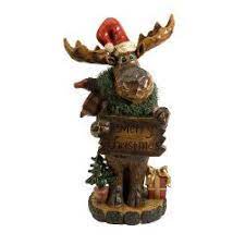 The sculpture towers 32 feet (10 meters) above the ground, and stretches 39 feet (12 meters). 36 Large Country Rustic Merry Christmas Carved Wood Moose Statue Christmas Moose Moose Decor Christmas Signs