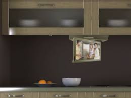 flipdown tv, pop up tv, cabinet door tv