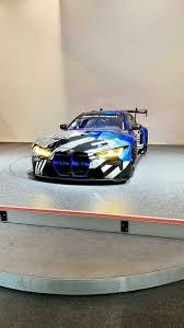 The exhaust exits just ahead of the passenger side. New Photos Of The Bmw M4 Gt3 Which Will Race In 2022