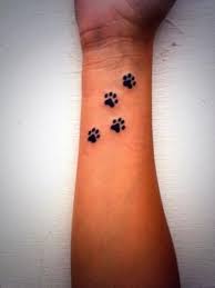 Cat Paw Prints On Wrist Tattoo Idea Print Tattoos Pawprint Tattoo Paw Tattoo