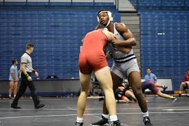 Three Monarchs Place as Wrestling Competes in Wolfpack Open