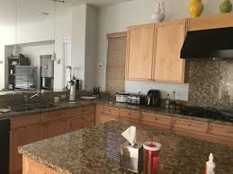 updating kitchen with gold granite