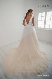 Evelyn Bridal Magnolia Is A Contemporary Ruffle And Feather Ball Gown The Crepe Bodice Features Clean Deep V Neckline Evelyn Bridal Magnolia Dress Ball Gowns