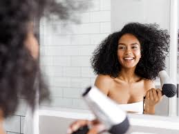 Drying your hair in the humid room where you just showered is counterintuitive at best. How To Blow Dry Your Hair So It Looks Like You Went To A Salon Self