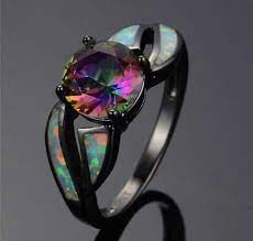 Pin By Jonathan Northrop On Pretty Fire Opal Ring Black Gold Engagement Rings Black Hills Gold Jewelry