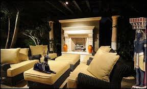 Art deco style egyptian queen lying on chaise lounge egyptian cold cas. Live Like An Egyptian Egyptian Home Decor Home Decor Egyptian Furniture