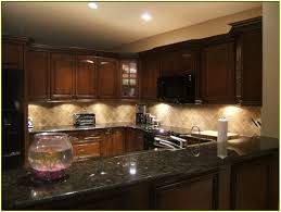 Quartz is an excellent alternative to granite because it for example, if you select a dark gray quartz countertop, select lighter gray tiles for your backsplash. Backsplash Ideas For Dark Cabinets Novocom Top