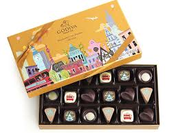 Godiva S Latest Box Of Chocolates Is A World Tour Of Flavors Godiva Chocolatier Godiva Chocolate Box