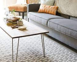 The ample drawer delivers a spot to stow magazines, game controllers and magazines, while the open storage space in this juniper coffee table is ideal for displaying coffee table books or decorative items. 6 Homemade Coffee Tables With Wooden Tops