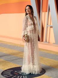 Witness Olivia Wilde's Iconic Naked Dress Appearance 2025