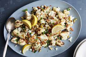 Roasted Cauliflower With Feta Almonds And Olives Recipe Recipe Roasted Cauliflower Olive Recipes Recipes