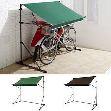 自転車やバイクのためのミニオーニングです ルーフ操作はワンタッチで 使わないときはコンパクトに折り畳みできます お気に入りの自転車やバイク その他玄関に置いているごみ箱や園芸用品などの雑貨類を雨や日差しから守ります サイズ本体 1850 1100 1500 1970mm