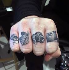 Finger tattoos can be small, bold and creative at the same time. Black Finger Tattoos For Men Novocom Top