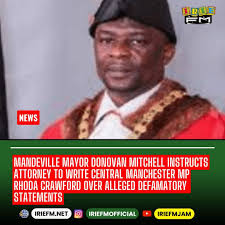 This is the kind of PNP Comrade , Comrade Skeng Don walking with long bag  and buying votes for in Central Manchester. Comrade Donovan Mitchell is his  name. He is going up