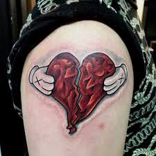 Bright red hearts and roses will spruce up the love of any couple. Broken Heart Love Is Pain Tattoo Designs