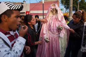 How to ask for favors? The Vatican And Santa Muerte