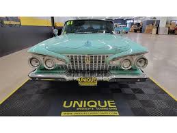 Image result for Twilight Turquoise 1961 Plymouth