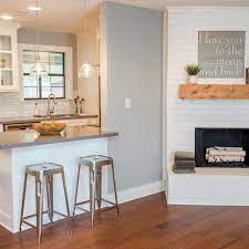 Add glass partition on the wall to reduce the noise, separate the kitchen from view and yet allow light inside your kitchen space. Photos Hgtv