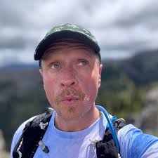 What are some motivating podcasts or audiobooks to listen to during long  runs?