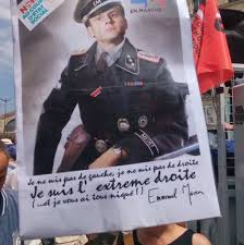 Dans ce qui semble être une prise de distance avec le gouvernement, emmanuel macron a notamment confié aux journalistes d'arte : Emmanuel Macron En Uniforme Ss Sur Une Pancarte D Une Manifestante Lfi Une Association Juive Porte Plainte Le Blog De Paul Tian