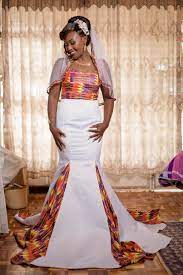 Beautiful Kenyan Bride In Kente Fabric And Satin Matte African Print Dress Designs African Fashion Dresses Latest African Fashion Dresses
