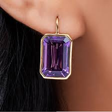 A pair of 3.6 carat, pear. February Birthstone Amethyst Buying Guide Gift Ideas