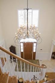 How To Hang A Chandelier In A Two Story Foyer Foyer Lighting Foyer Chandelier Foyer Decorating