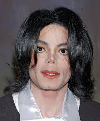 Once you have your hair wrapped into a bun the way that you like it, tug on a piece of. Michael Jackson Medium Wavy Black Hairstyle