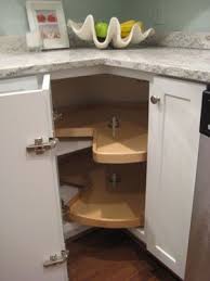 The lazy susan is probably the oldest trick in the book and most interior designers go with this idea. 9 Best Lazy Susan Corner Cabinet Ideas Corner Kitchen Cabinet Lazy Susan Kitchen Corner