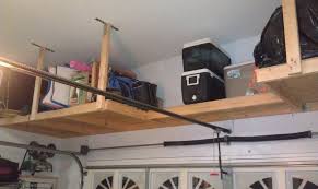 When clutter has taken over your garage, there are two options: Above Garage Door Storage By Vaprtral Lumberjocks Com Woodworking Community