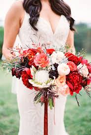 Protea flower, wedding centerpieces photos. Wedding Bouquets Inspiration Bold Peony Protea Ranunculus Rose And Scabiosa Wedding Bouquet Photography Weddingtrend Home Of Bridal Trends The Hottest New Wedding Trends Straight From The Experts