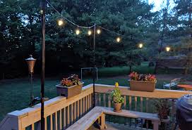 I personally think outdoor lights look so much better when they are draped in the middle and sort of slack down some. How To Hang String Lights On A Deck Easy Diy Tutorial