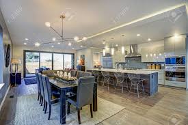 Don't like glass tops generally but the legs are a work of art. Sleek Modern Kitchen Design With A Large Kitchen Peninsula And Stock Photo Picture And Royalty Free Image Image 97874024