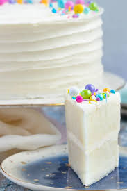 Naturally white, and easy to mix up with no special ingredients required, this white cake recipe from scratch is moist and delicious! White Cake Recipe From Scratch Goodie Godmother