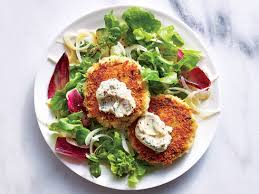 A quick and easy crab cake that features buttery round crackers, tarragon, green onions, and red pepper flakes. Crab Cakes And Spicy Mustard Sauce Recipe Myrecipes