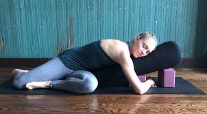 One midway underneath the bolster on its horizontal edge, . Use These 4 Restorative Yoga Poses For Immediate Stress Relief Urban Om Nyc