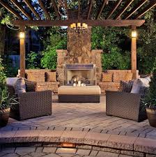 In the image above, this outdoor fireplace is made out of textured stones in light shades of gray and brown. 53 Most Amazing Outdoor Fireplace Designs Ever